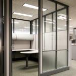 The solid surface & glass panel provides privacy while maintaining a sense of openess.