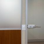 A Spacer is located beside a door frame to provide a location for a lighting device.