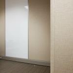 A writable dry-erase wallcovering was used as a panel finish in several offices.