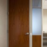 A full-height wood veneer door in Light Brown Walnut matches the wood veneer panel insert.