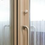 An offset pull is required for sliding doors at the jamb post.